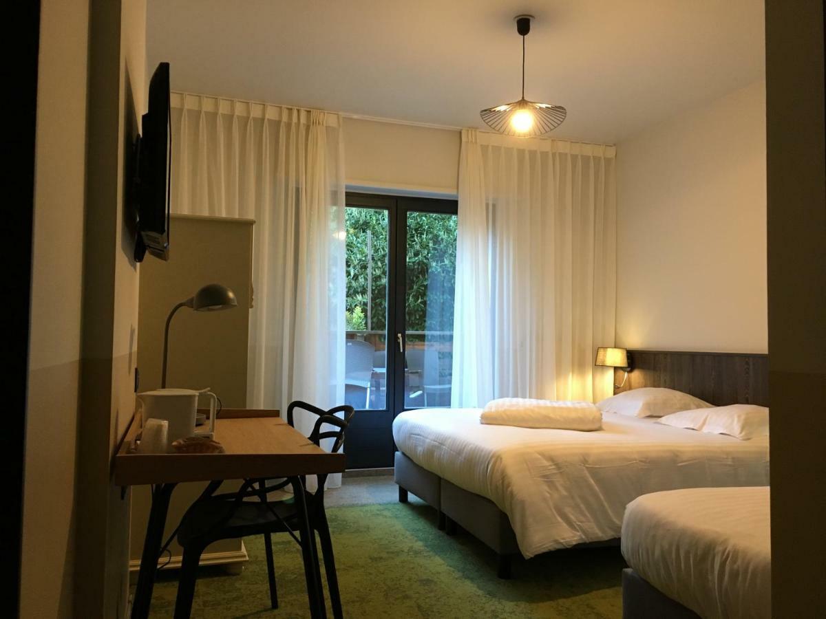 תאן Hotel Restaurant Au Floridor מראה חיצוני תמונה